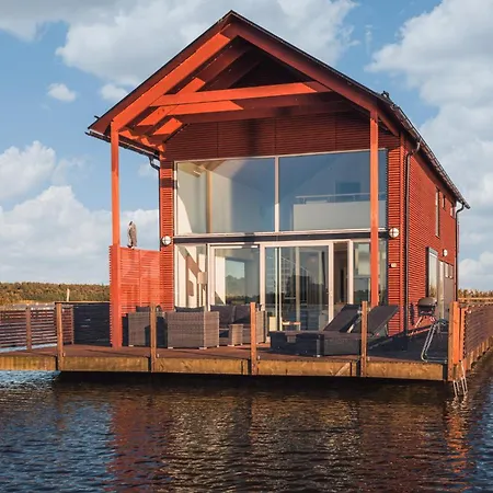 Kelluvat Huvilat, Kapteeni, Reposaari Villa