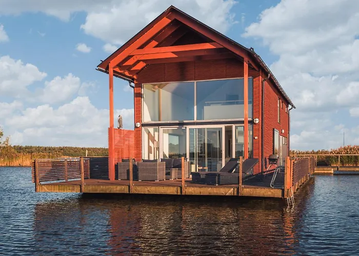 Kelluvat Huvilat, Kapteeni, Reposaari Villa